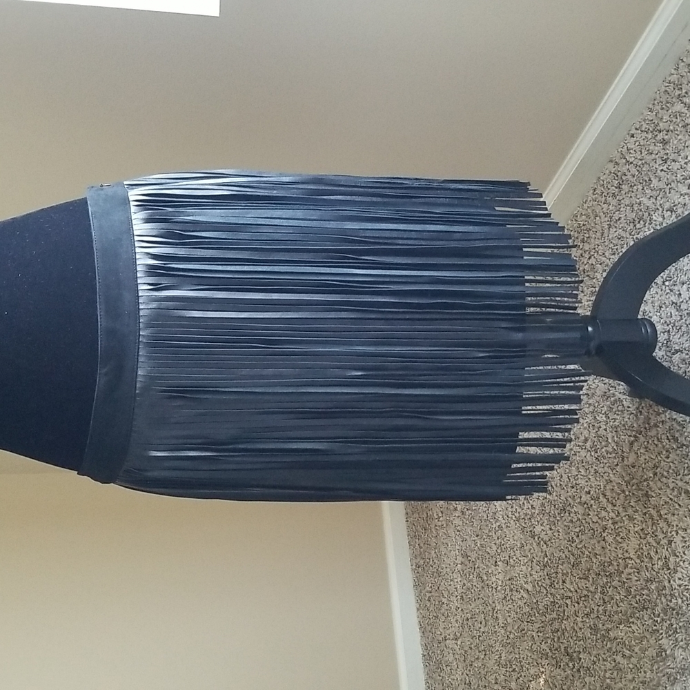Unique Leather Strips Skirt with Suede around waist and fabric underneath.